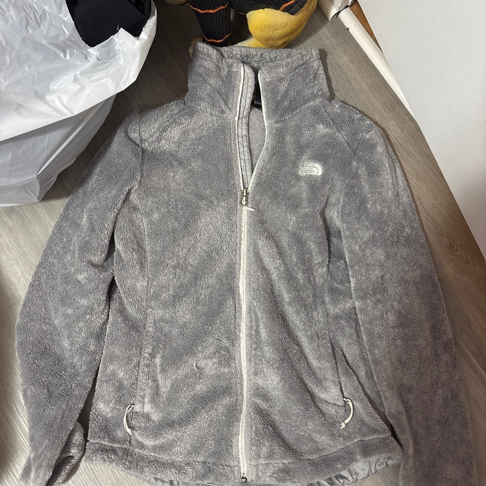 Woman’s fuzzy north face jacket